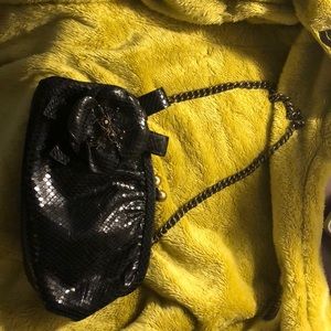 Handbag/clutch with chain; has snap closure
